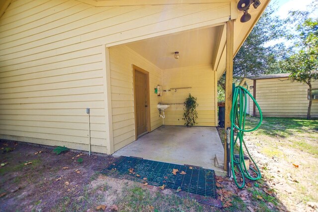 exterior space featuring an outdoor structure and a storage unit