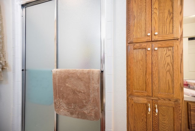 bathroom with an enclosed shower