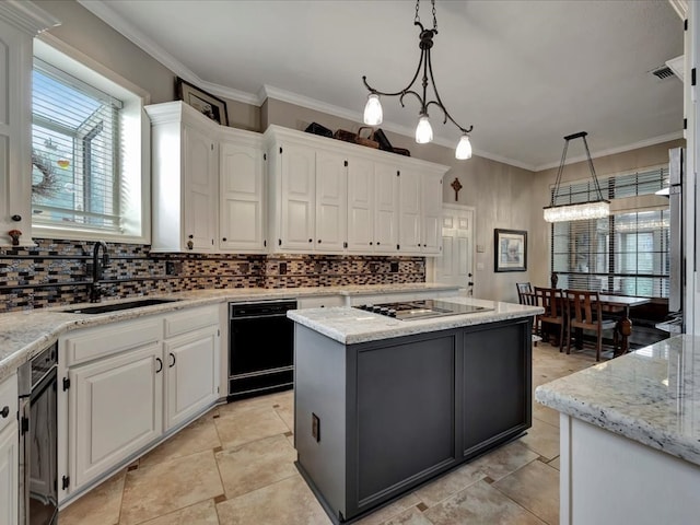 kitchen with white cabinetry, black dishwasher, cooktop, decorative light fixtures, and a kitchen island