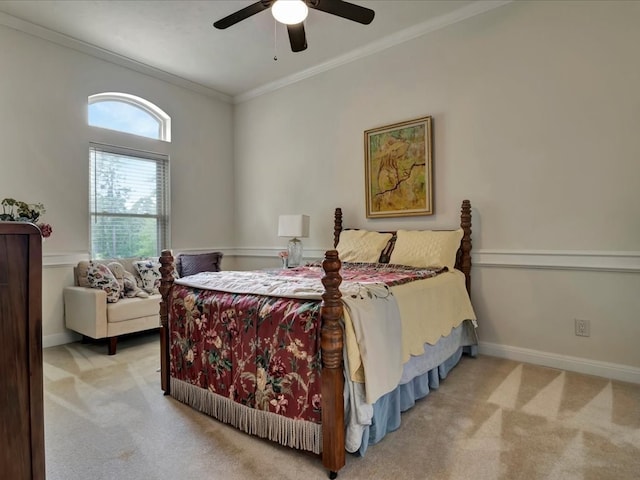 bedroom with light carpet, ceiling fan, and ornamental molding