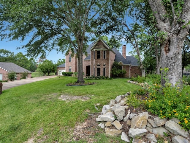 view of front of house with a front yard