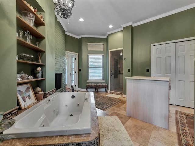 bathroom with tile patterned floors, an inviting chandelier, crown molding, and independent shower and bath