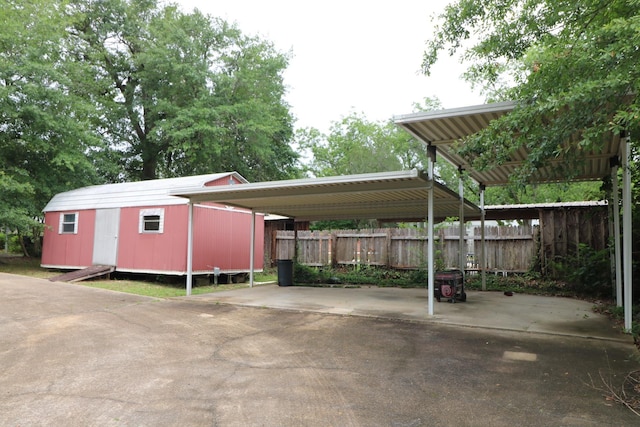 exterior space with a carport