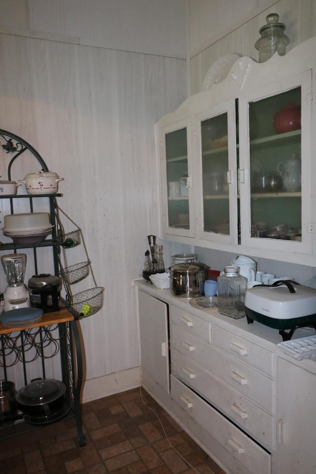 bar with white cabinetry