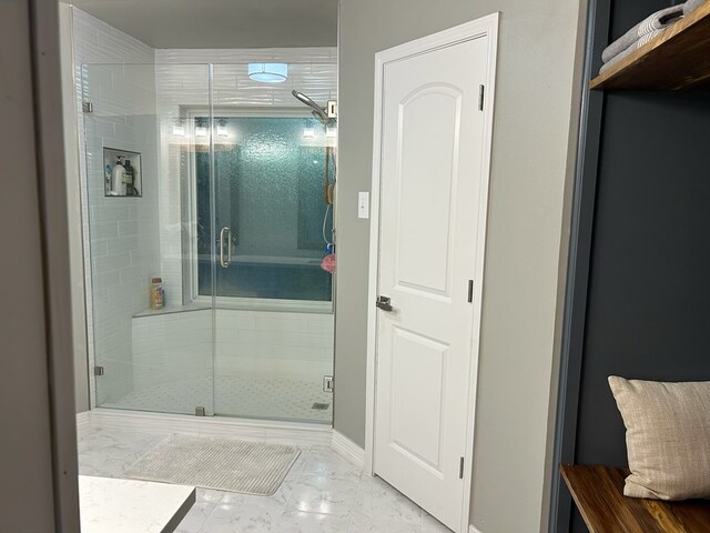 270 Lakeshore Dr, Brookeland, TX 75931 - full bathroom with marble look tile flooring and a stall shower