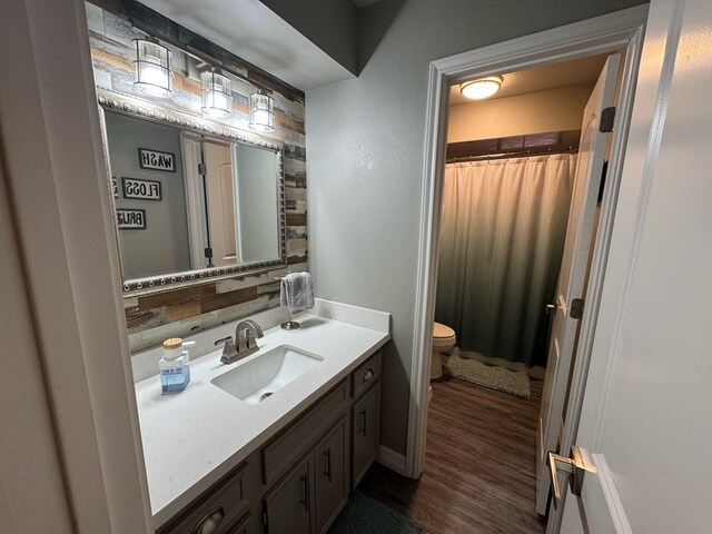 270 Lakeshore Dr, Brookeland, TX 75931 - bathroom featuring vanity, wood finished floors, and curtained shower