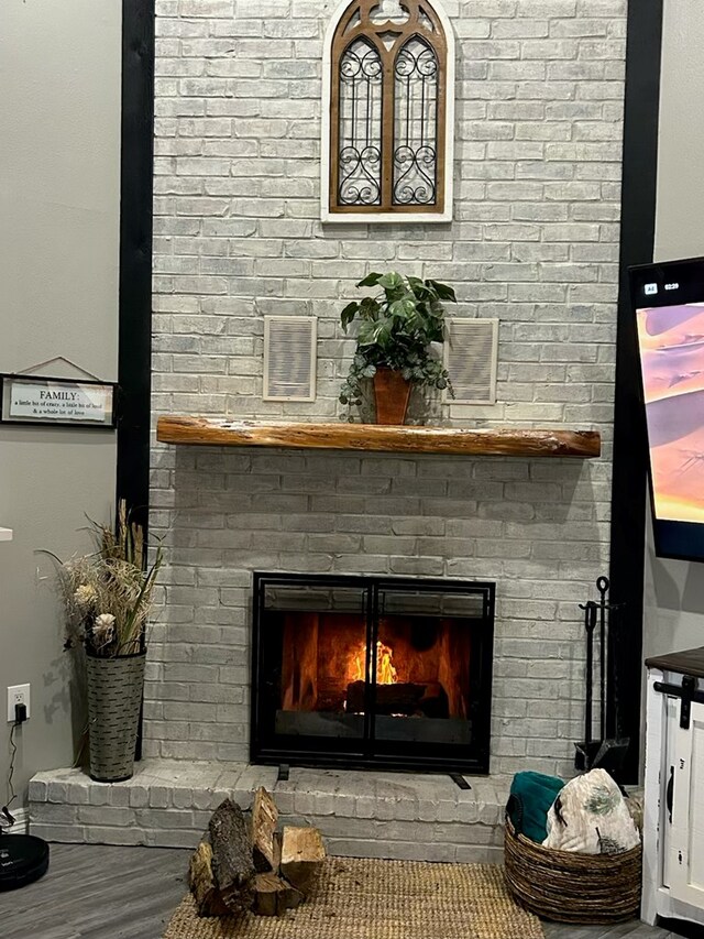270 Lakeshore Dr, Brookeland, TX 75931 - detailed view of a fireplace and wood finished floors