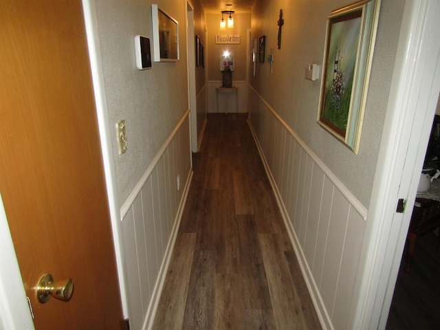 hall with dark wood-type flooring