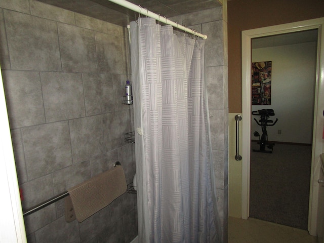 bathroom with a shower with curtain