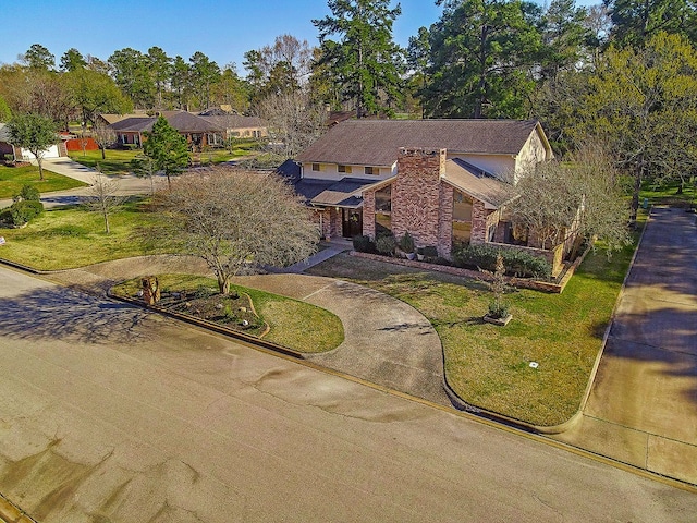 view of front of home with a front lawn