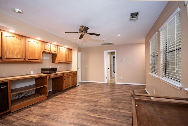 kitchen featuring ceiling fan and hardwood / wood-style floors