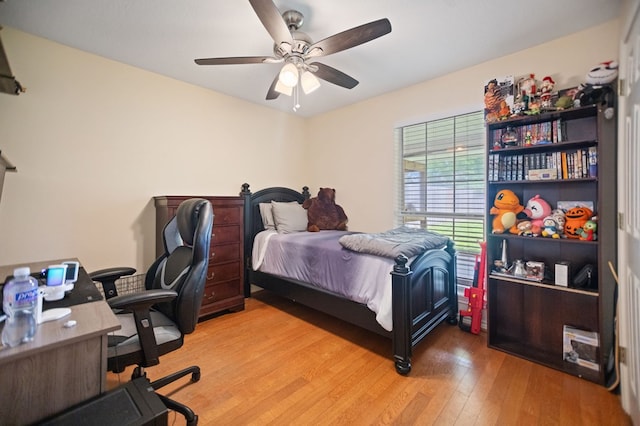 112 Lewellin Pl, Lufkin, TX 75904 - bedroom with light wood-type flooring, a desk, and ceiling fan