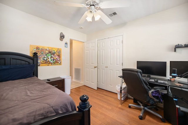 112 Lewellin Pl, Lufkin, TX 75904 - bedroom featuring light wood-type flooring, a closet, an office area, and a ceiling fan