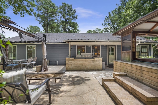 1594 Beachrock Dr, Brookeland, TX 75931 - view of patio featuring outdoor dining area and area for grilling