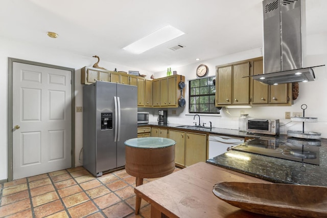 kitchen with sink, island exhaust hood, and appliances with stainless steel finishes