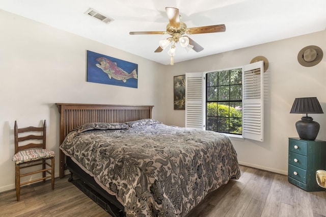 1594 Beachrock Dr, Brookeland, TX 75931 - bedroom featuring wood finished floors and a ceiling fan