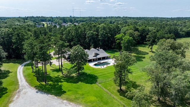 4207 S Chestnut St, Lufkin, TX 75901 - view of subject property with a heavily wooded area