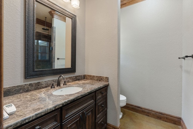 4207 S Chestnut St, Lufkin, TX 75901 - bathroom with toilet, vanity, baseboards, a textured wall, and a shower