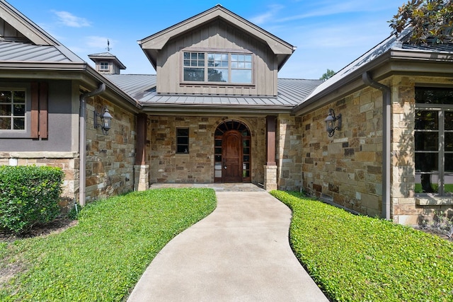 4207 S Chestnut St, Lufkin, TX 75901 - entrance to property with a standing seam roof, stone siding, metal roof, and a porch