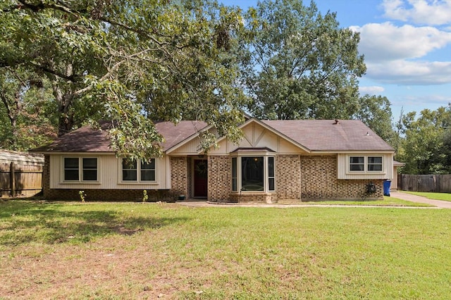 single story home with a front yard