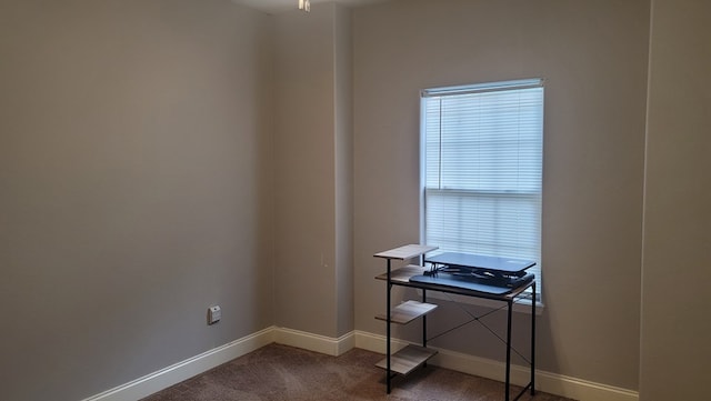 138 Breezeway Dr, Brookeland, TX 75931 - carpeted empty room with baseboards