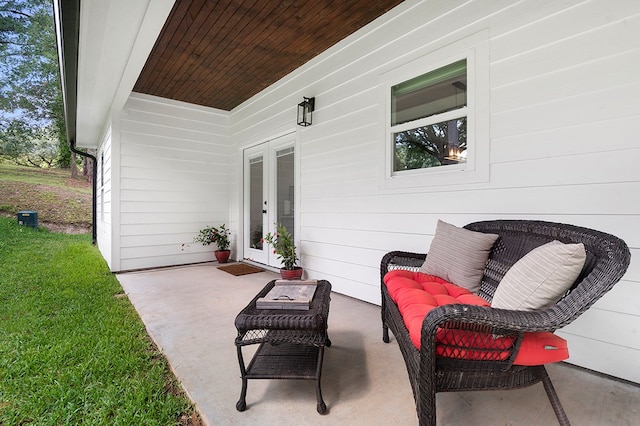 155 Sweetbriar Ct, Brookeland, TX 75931 - view of patio featuring french doors