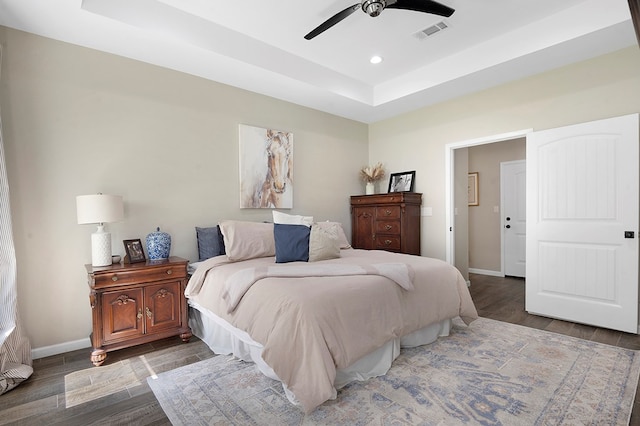 155 Sweetbriar Ct, Brookeland, TX 75931 - bedroom featuring a raised ceiling, wood finished floors, recessed lighting, and a ceiling fan