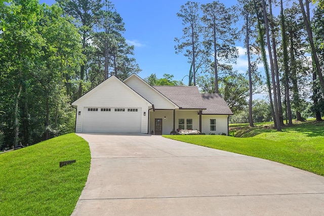 155 Sweetbriar Ct, Brookeland, TX 75931 - single story home featuring a garage, driveway, and a front lawn