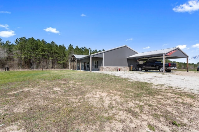 737 Martin Cochran Rd, Huntington, TX 75949 - view of green lawn with a carport