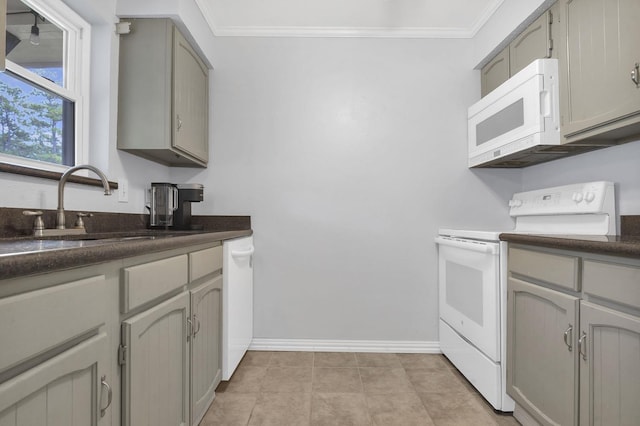 kitchen with gray cabinetry, sink, white appliances, light tile patterned flooring, and ornamental molding