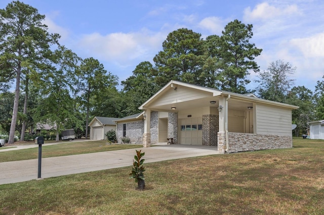 view of front of house featuring a carport, a garage, and a front lawn