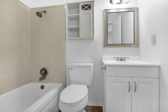 full bathroom featuring vanity, toilet, and tiled shower / bath