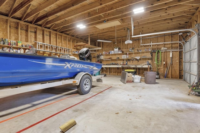 garage featuring a workshop area