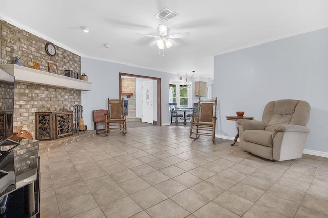 interior space with ceiling fan, ornamental molding, brick wall, and a brick fireplace