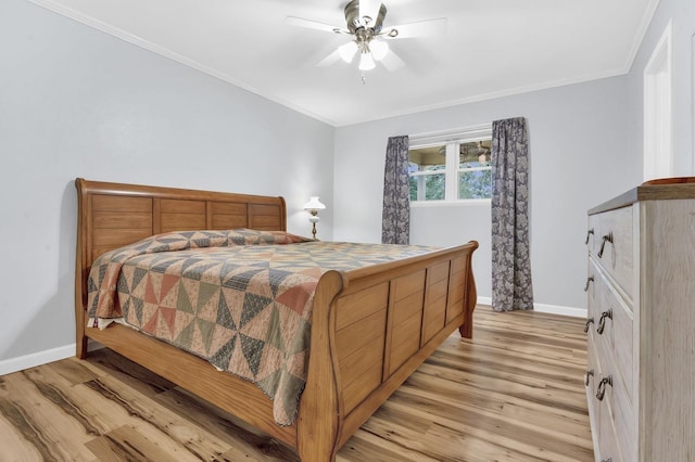 bedroom featuring light wood-type flooring, ceiling fan, and ornamental molding