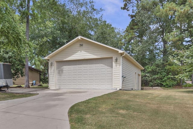 garage with a lawn