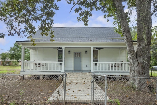 bungalow-style house featuring ceiling fan and a porch