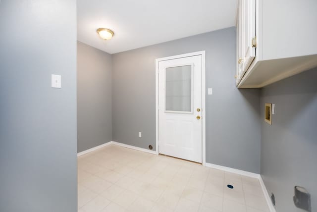 3712 Ashbury Ln, Nacogdoches, TX 75965 - laundry room with cabinet space, hookup for a washing machine, and baseboards