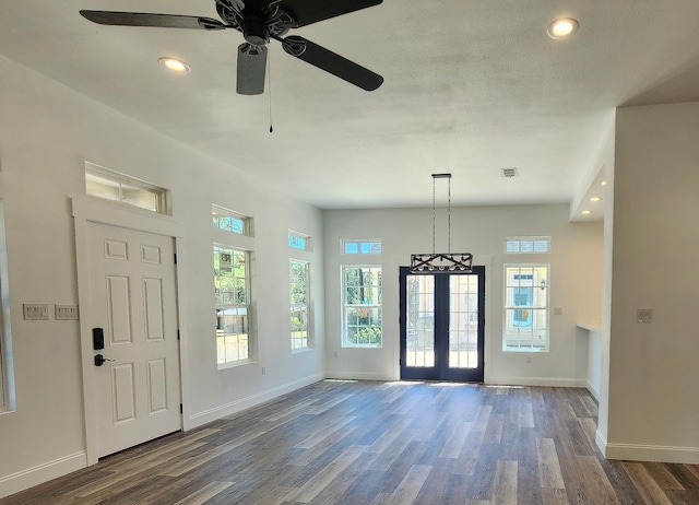 entrance foyer with ceiling fan and dark hardwood / wood-style floors