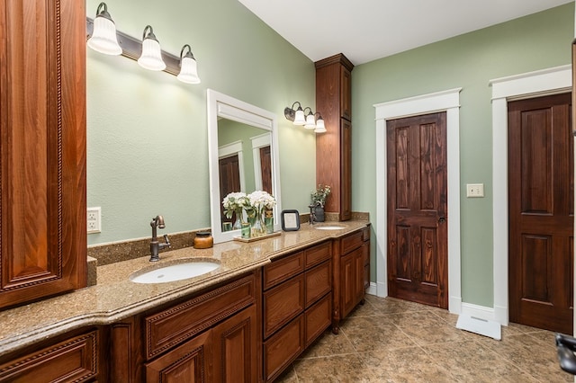 bathroom featuring tile patterned floors and vanity