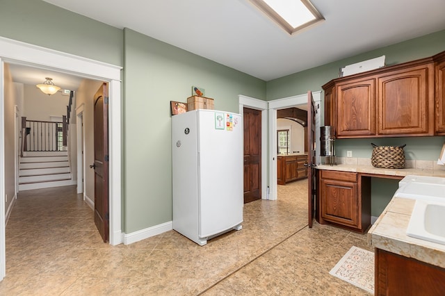 kitchen with white refrigerator