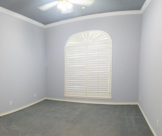 spare room featuring carpet, baseboards, ornamental molding, and ceiling fan