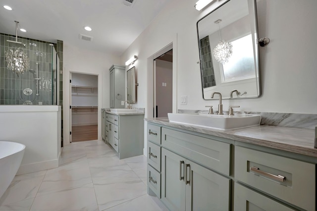bathroom with a sink, marble finish floor, two vanities, a shower stall, and visible vents