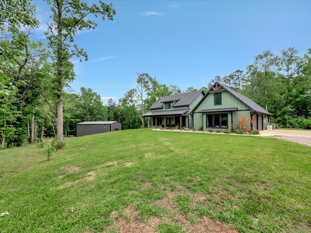 exterior space with a yard and driveway