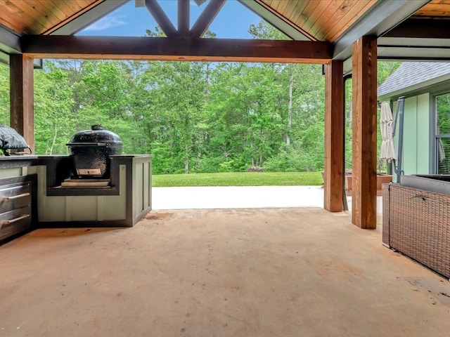 view of patio / terrace with a gazebo, a grill, and exterior kitchen