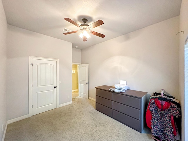 carpeted bedroom featuring ceiling fan