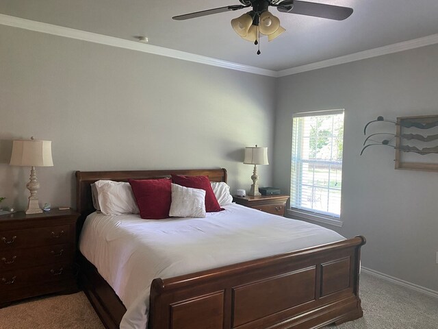 429 Derek Rd, Lufkin, TX 75904 - carpeted bedroom with baseboards, crown molding, and a ceiling fan