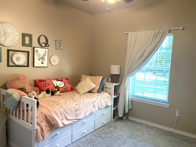 429 Derek Rd, Lufkin, TX 75904 - carpeted bedroom with baseboards and a ceiling fan