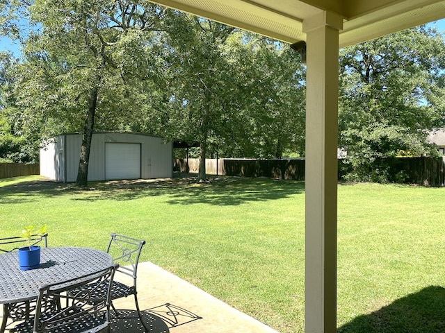 429 Derek Rd, Lufkin, TX 75904 - view of yard with a patio area, outdoor dining area, and a garage