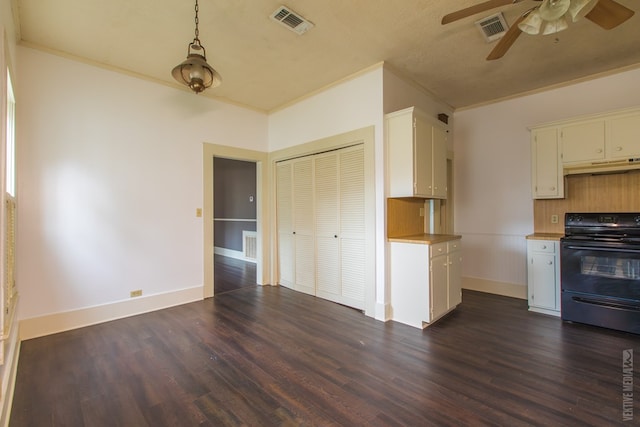 511 1st, Jasper, TX 75951 - kitchen with electric range, under cabinet range hood, a ceiling fan, dark wood finished floors, and crown molding